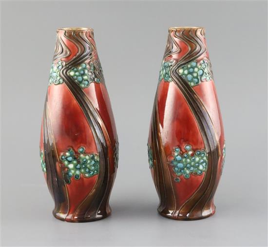 A pair of Mintons secessionist pottery vases, c.1918, H. 24cm